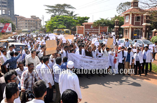 Protest outside Yenepoya Hospital opposing assault on doctor accused of sexual abuse